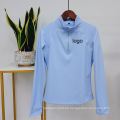 Camisa de competencia ecuestre de Baselayer azul Zip Zip